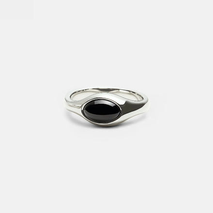 Dark pearl on a grey studio backdrop