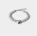 Heart of pearl on a grey studio backdrop