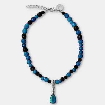 Ocean drop on a grey studio backdrop