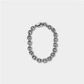 Urban chain on a grey studio backdrop