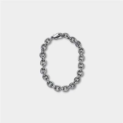 Urban chain on a grey studio backdrop